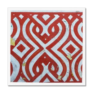 White-framed 20x20 inch photograph showcasing vibrant crimson and white geometric aztec patterns.