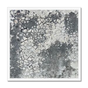 Crackled paint over stone texture in grayscale, captured in a white-framed 20x20 inch photograph.