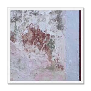 20x20 inch framed photograph capturing the weathered texture of a Mexican wall, with peeling white, pink, and green paint on a rough plaster surface.