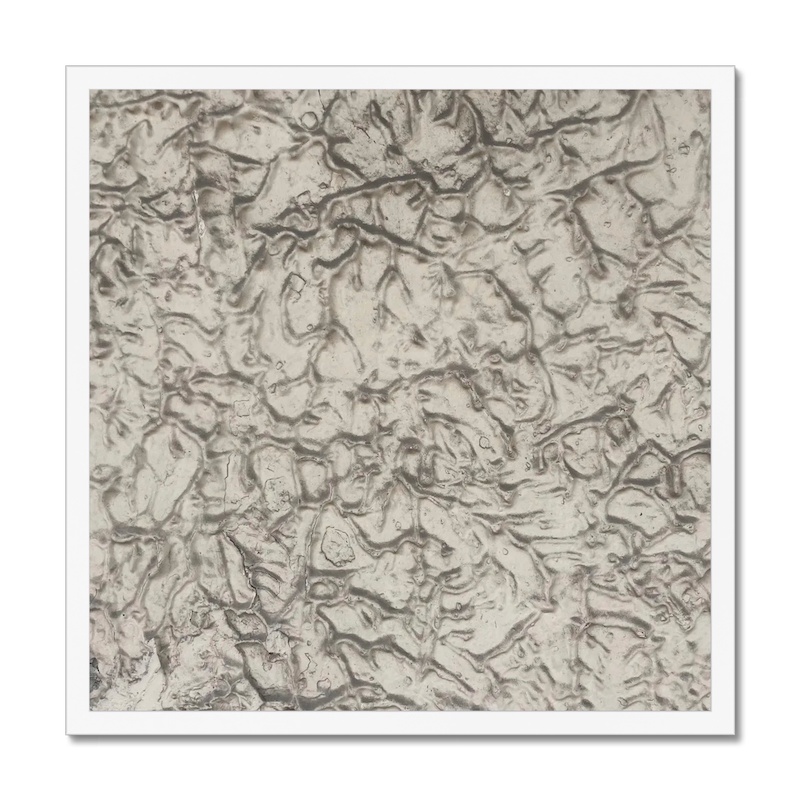 Textured abstract design in grayscale, photographed and presented in a 20x20 inch white frame.