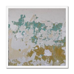 White-framed 20x20 inch photo of a plaster wall with peeling turquoise and gold paint, revealing layers of history.