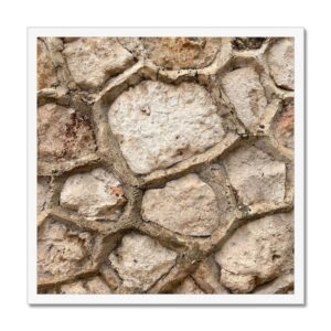 Robust rock wall with thick ridges of raised mortar photographed and framed at 20x20 inches.