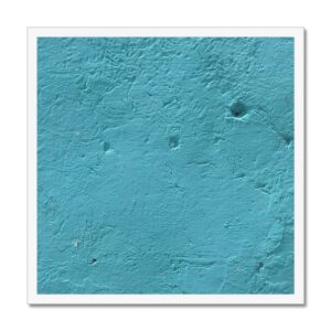 Plaster wall with subtle surface imperfections painted a calming monochrome turquoise mounted in a 20x20” white frame.