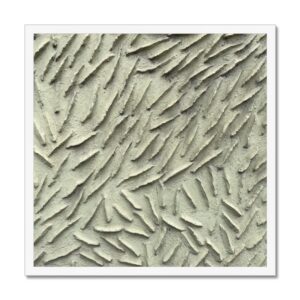 A white-framed 20x20” photo showcasing a textured wall with a distinct pattern of raised ridges, resembling a school of minnows.